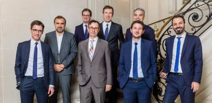 photo of panelists, including Orrick Paris Finance partner Amaury de Feydeau