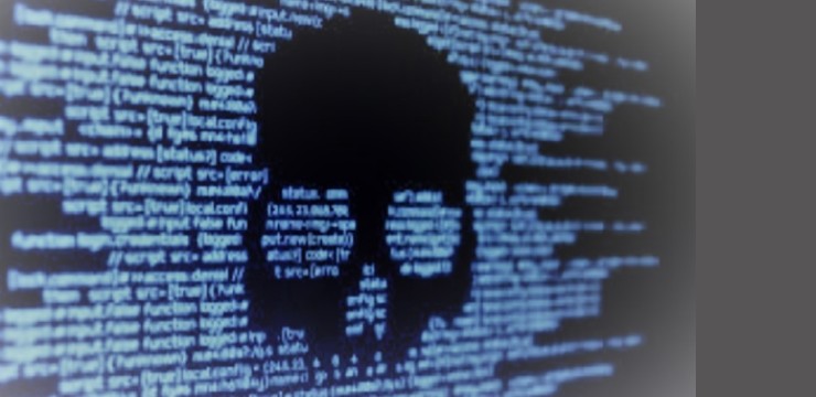 skull superimposed over computer code on screen